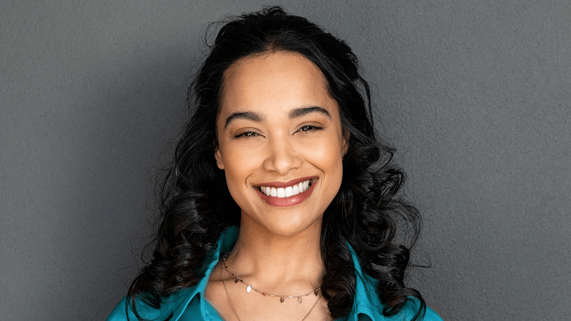 An image of a lady smiling